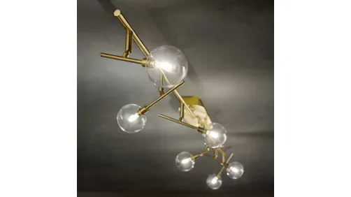 Lampada da parete Maracas in metallo rifinito in ottone satinato con diffusori orientabili in vetro soffiato trasparente di Ideal Lux